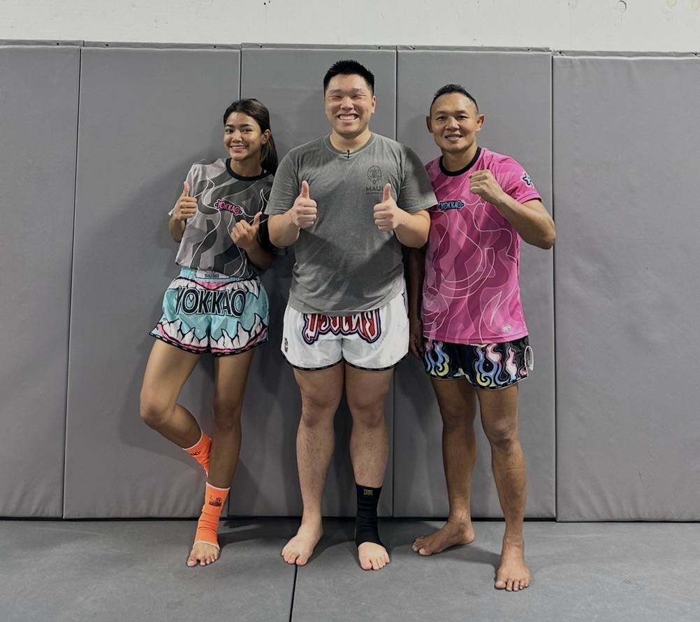 Kyle with trainers after a Muay Thai session